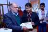 Gurukul-Student-received-award-from-LG-Sir